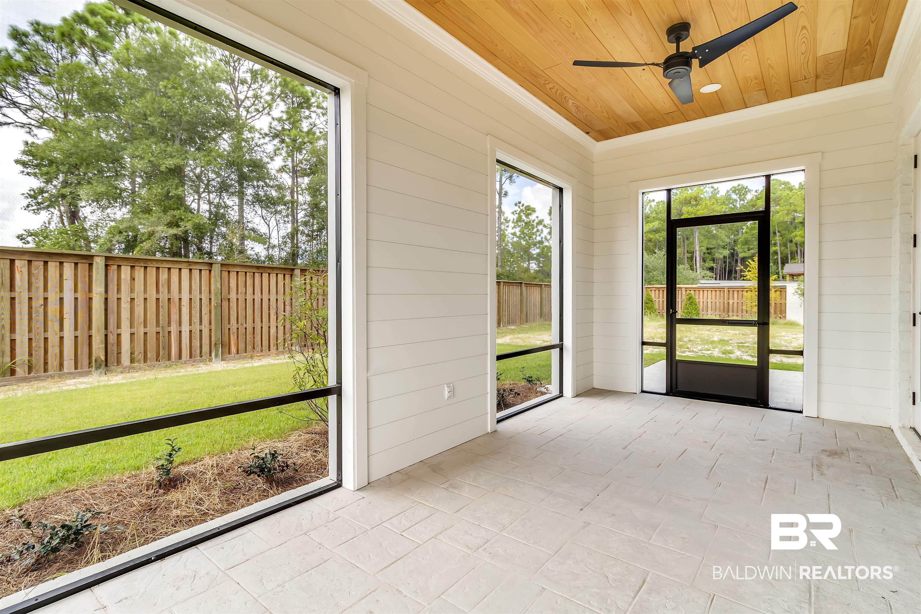 829 Inlet Circle Gulf Shores, AL 36542 - Photo 23 of 31 Unfurnished sunroom with ceiling fan and wooden ceiling