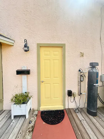 a view of a backyard with a patio