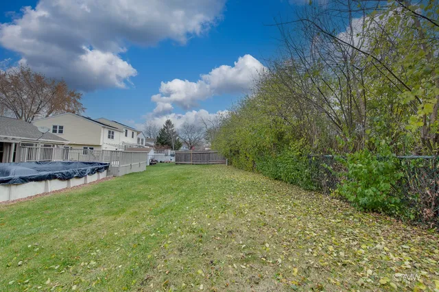 a view of a house with a back yard