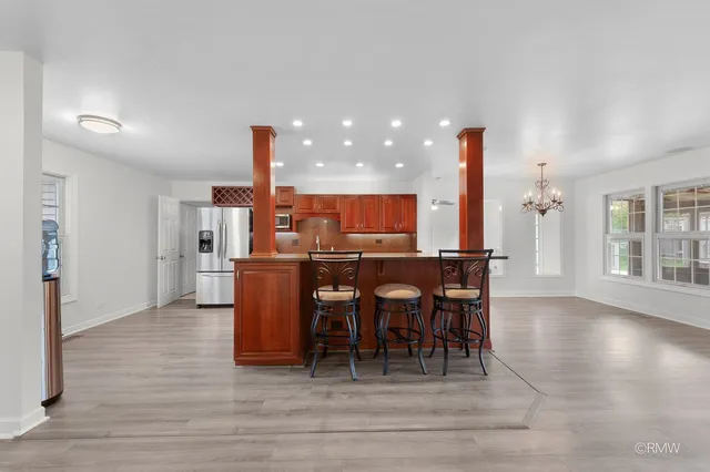 a view of a dining room with furniture