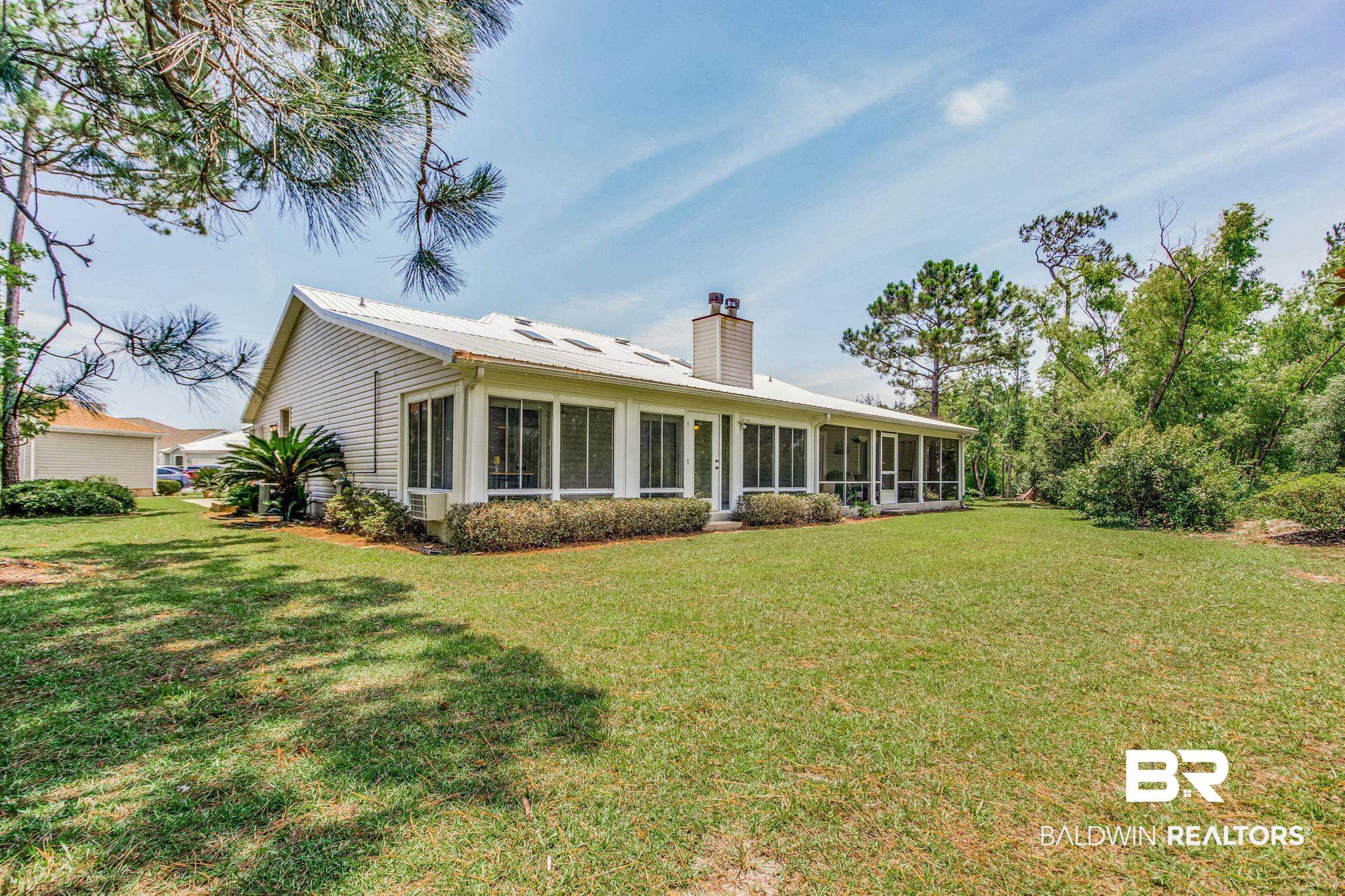 The back yard abuts the Gulf State Park.