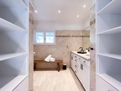 a bed room with a bed and a dresser