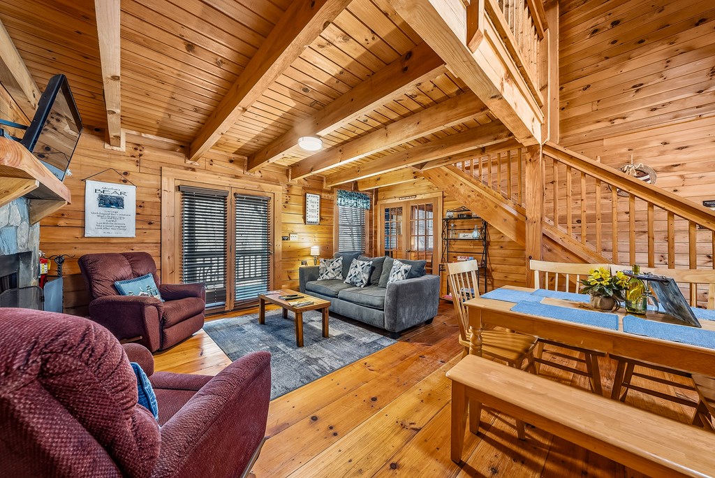 2136 Hines Gap Road Warm Springs, GA 31830 - Photo 14 of 63 a living room with furniture a ceiling fan and a rug