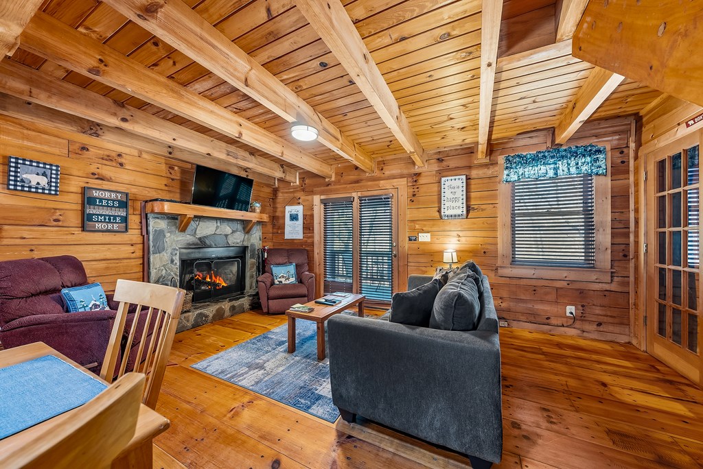 2136 Hines Gap Road Warm Springs, GA 31830 - Photo 16 of 63 a living room with furniture and a fireplace
