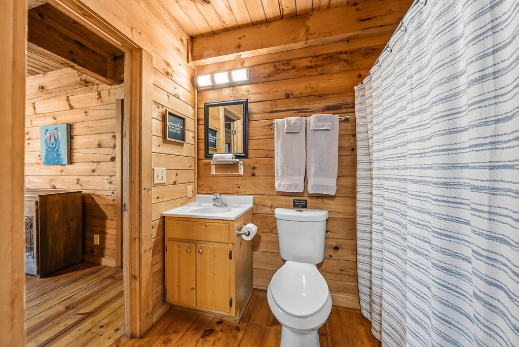 2136 Hines Gap Road Warm Springs, GA 31830 - Photo 18 of 63 a bathroom with a toilet and a shower