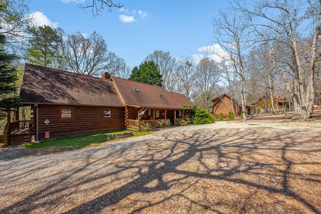 2136 Hines Gap Road Warm Springs, GA 31830 - Photo 2 of 63 a house with trees in front of it