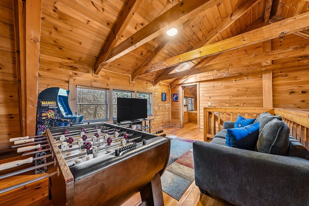 2136 Hines Gap Road Warm Springs, GA 31830 - Photo 24 of 63 a living room with furniture and a flat screen tv
