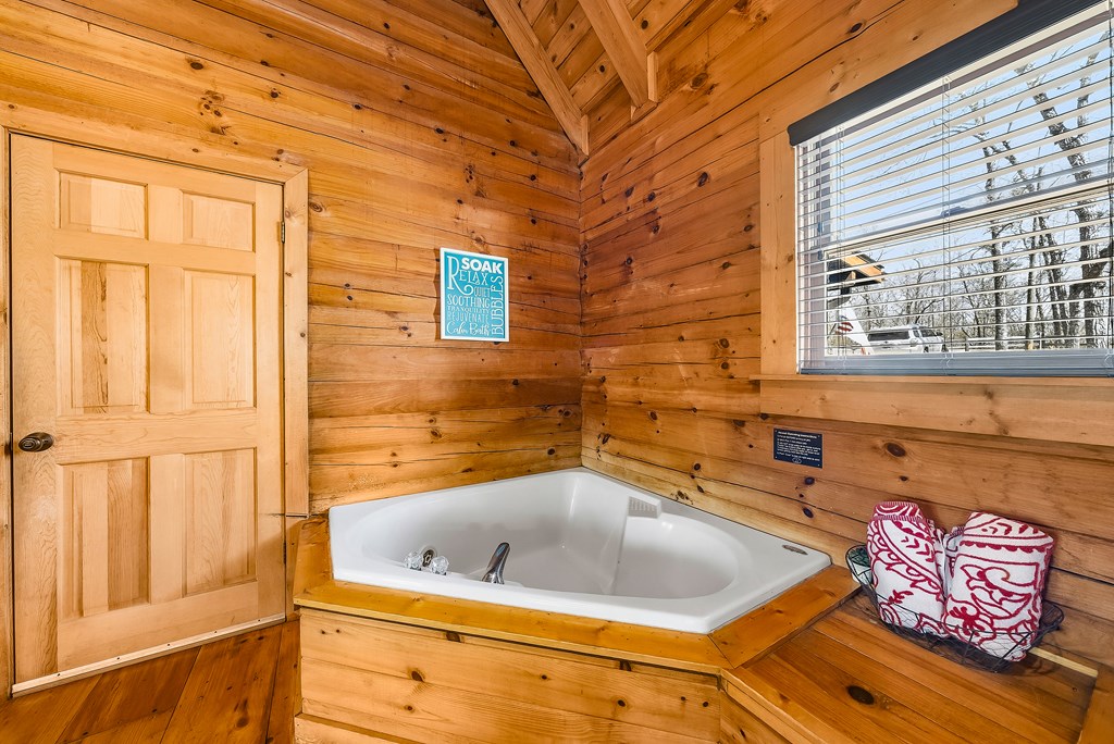 2136 Hines Gap Road Warm Springs, GA 31830 - Photo 41 of 63 a bathroom with a tub and shower