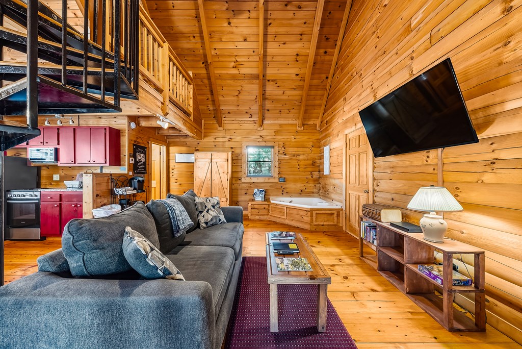 2136 Hines Gap Road Warm Springs, GA 31830 - Photo 47 of 63 a living room with furniture and a flat screen tv