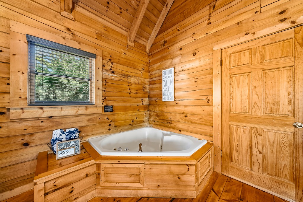 2136 Hines Gap Road Warm Springs, GA 31830 - Photo 48 of 63 a bathroom with a sink and a bathtub