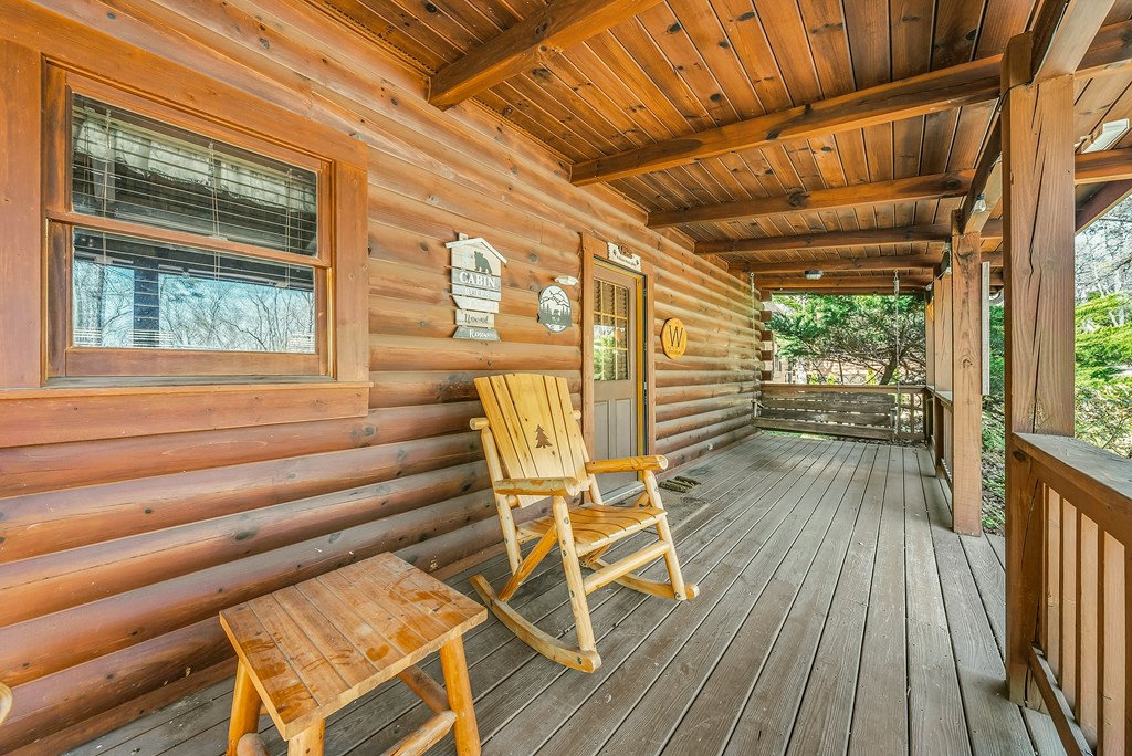 2136 Hines Gap Road Warm Springs, GA 31830 - Photo 5 of 63 a view of a chairs on the deck