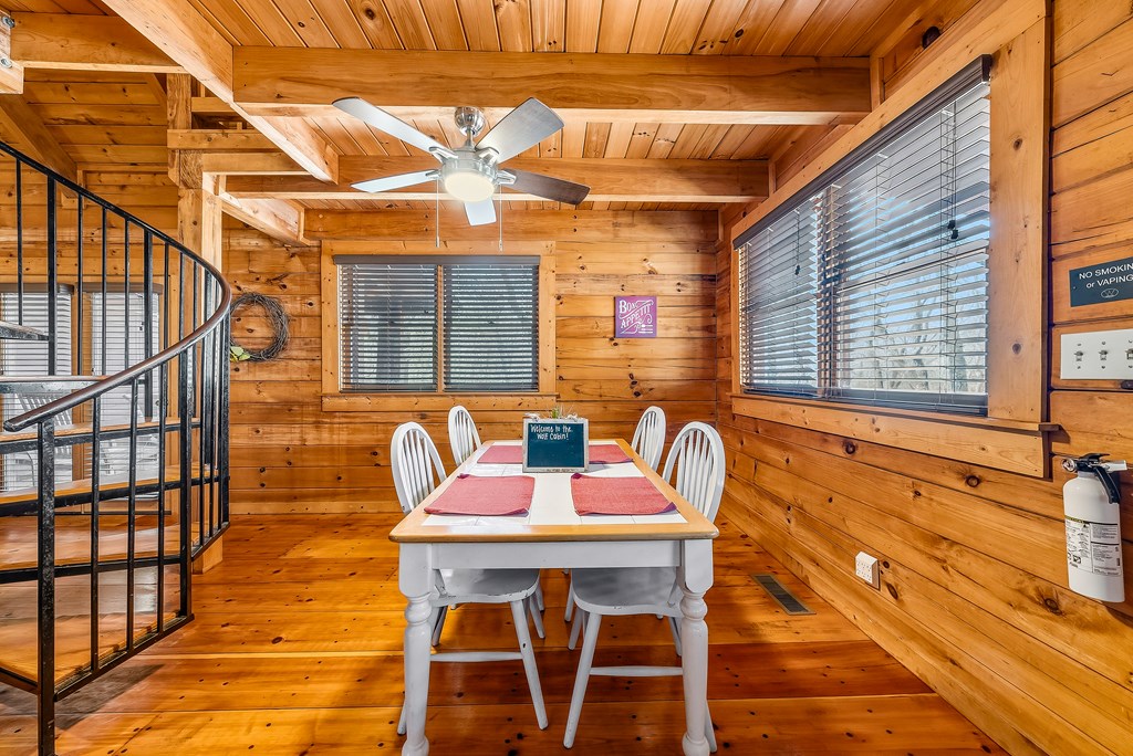 2136 Hines Gap Road Warm Springs, GA 31830 - Photo 51 of 63 a dining room with furniture and wooden floor