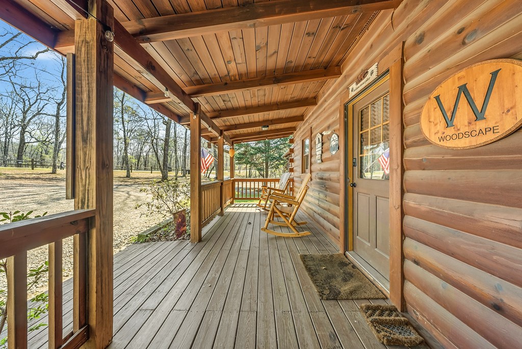 2136 Hines Gap Road Warm Springs, GA 31830 - Photo 6 of 63 a view of a balcony with wooden floor