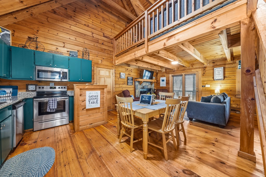 2136 Hines Gap Road Warm Springs, GA 31830 - Photo 7 of 63 a dining hall with stainless steel appliances granite countertop a stove and a wooden floors