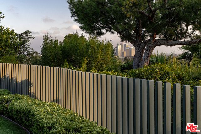 a balcony with wooden fence