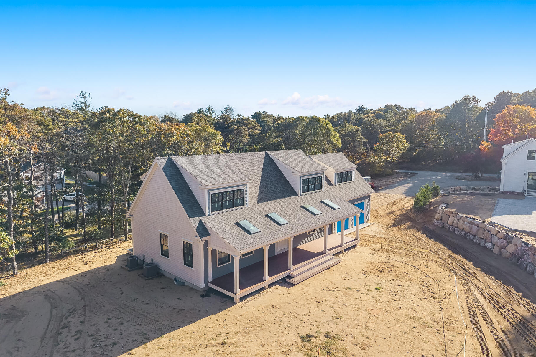 106-108 Chatham Road Harwich, MA 02645 - Photo 12 of 30 a view of a house with a mountain in the background