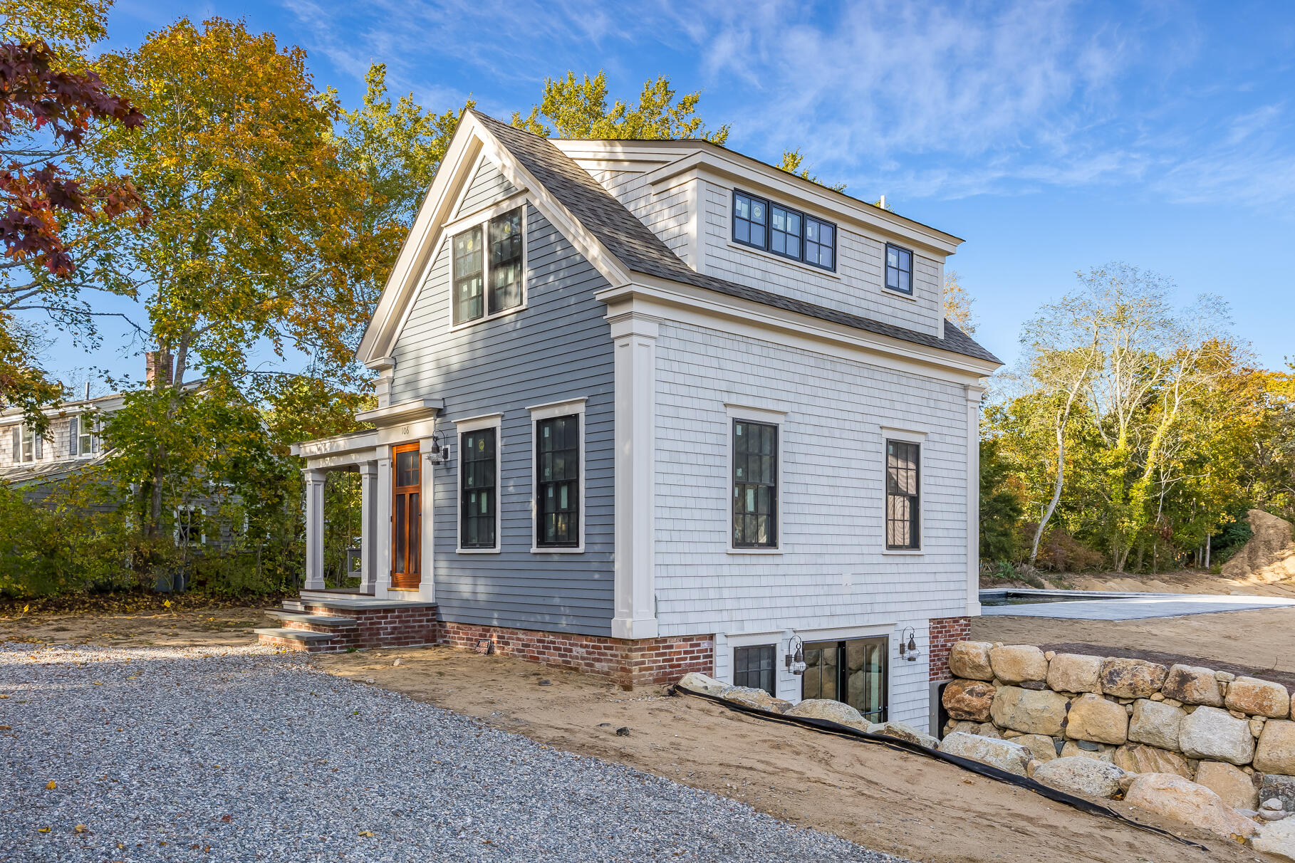 106-108 Chatham Road Harwich, MA 02645 - Photo 2 of 30 a front view of a house with a yard