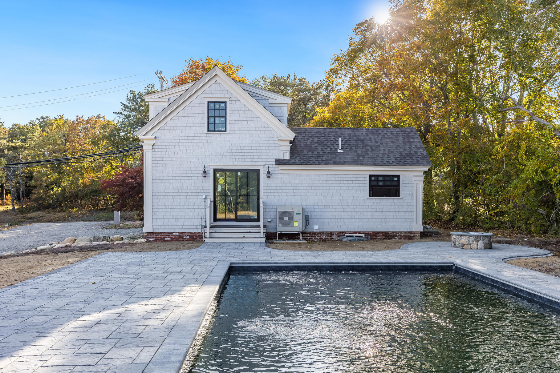 106-108 Chatham Road Harwich, MA 02645 - Photo 21 of 30 a view of a house with pool plants and large tree
