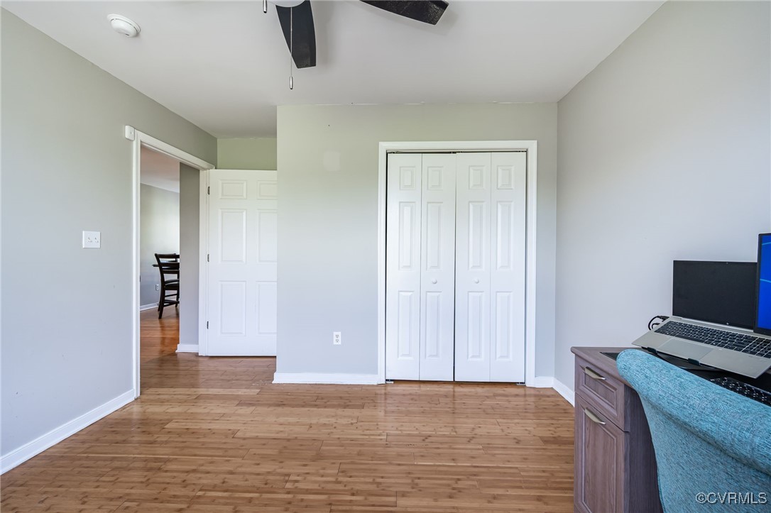28312 Butler Branch Road Petersburg, VA 23805 - Photo 17 of 33 a view of room with window and wooden floor