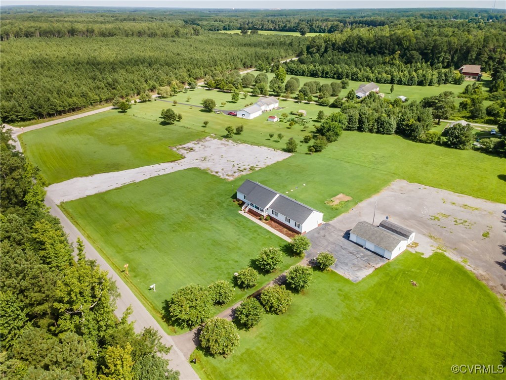 28312 Butler Branch Road Petersburg, VA 23805 - Photo 2 of 33 an aerial view of a golf course with a big yard