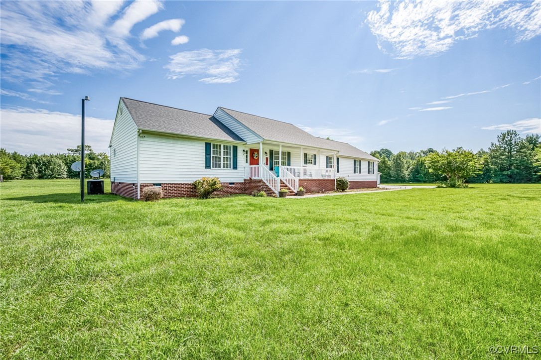 28312 Butler Branch Road Petersburg, VA 23805 - Photo 25 of 33 a front view of house with yard and green space
