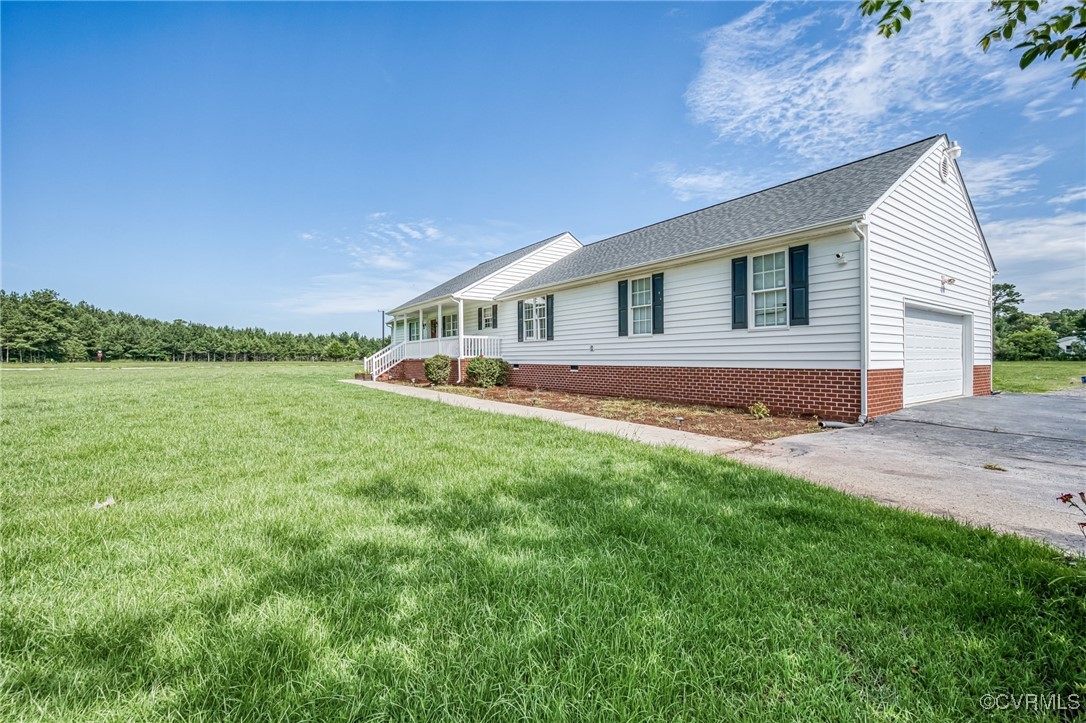 28312 Butler Branch Road Petersburg, VA 23805 - Photo 28 of 33 a front view of a house with garden