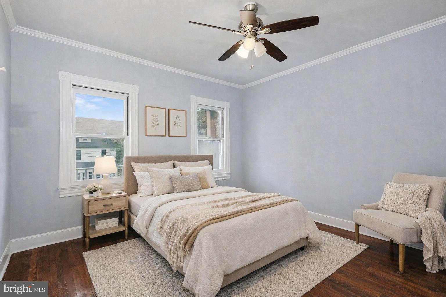 4014 33rd Street Mount Rainier, MD 20712 - Photo 21 of 37 a bedroom with a bed and a chair