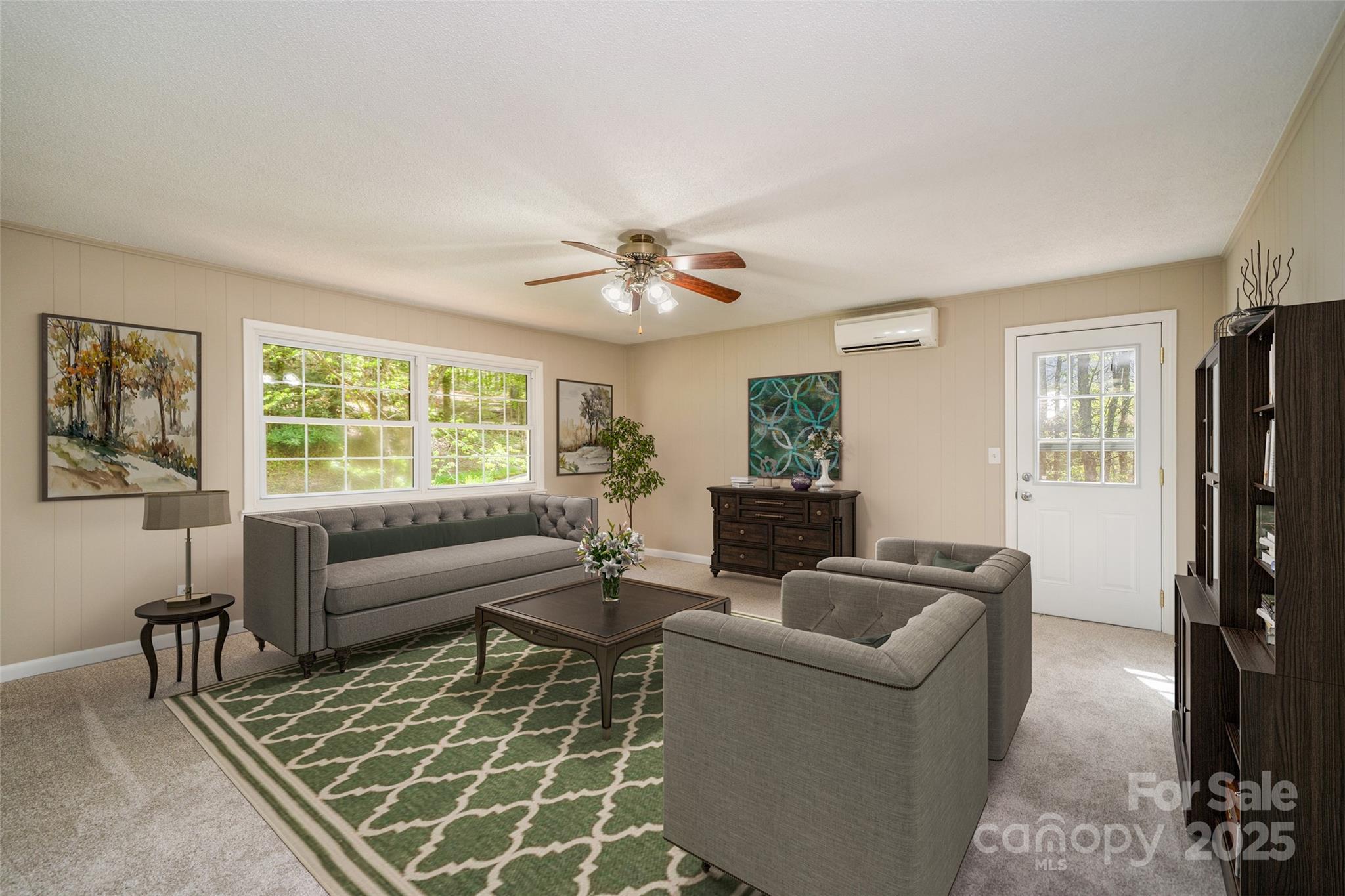 145 Jeter Mountain Road Hendersonville, NC 28739 - Photo 13 of 31 a living room with furniture and a window