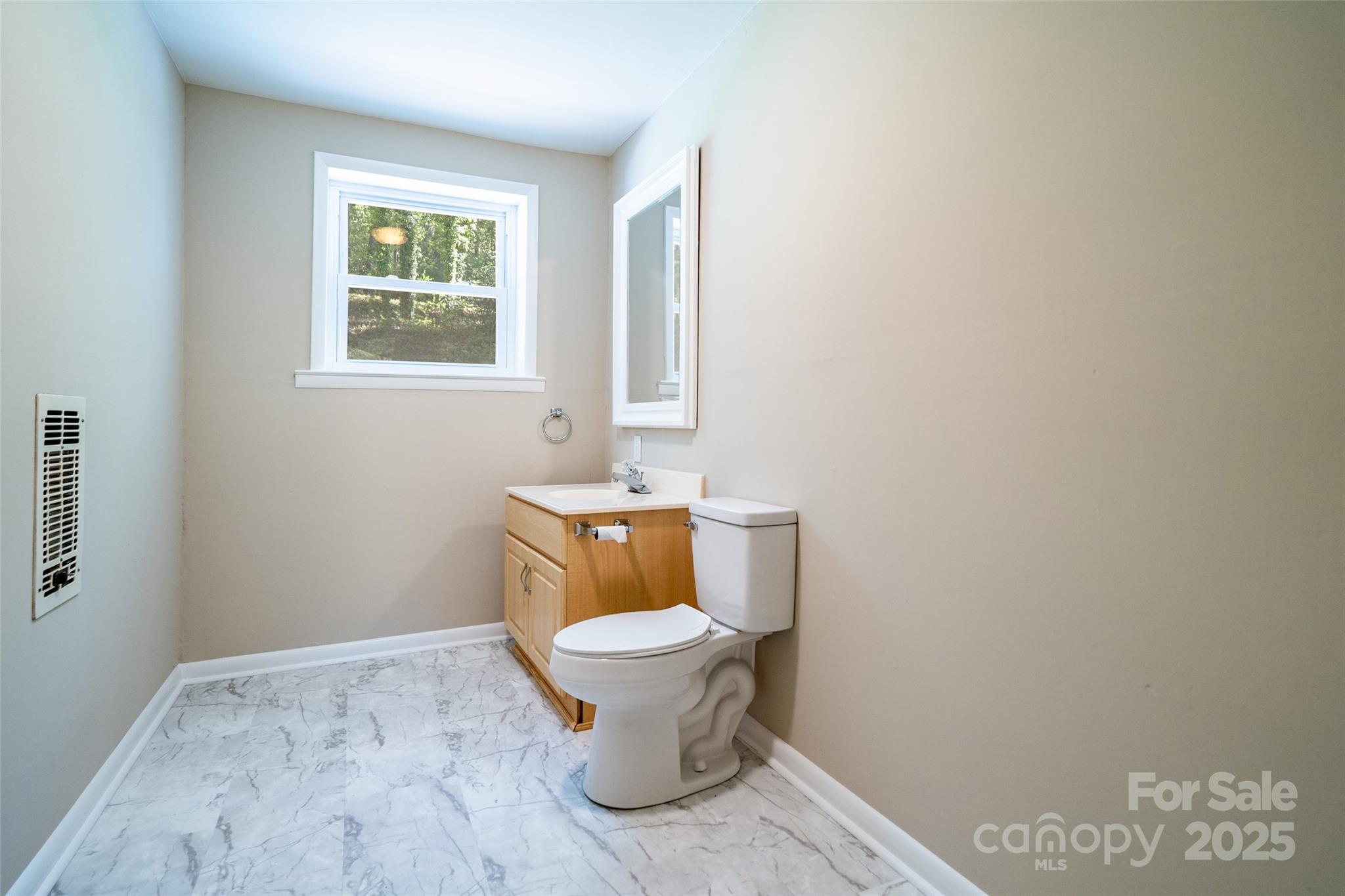 145 Jeter Mountain Road Hendersonville, NC 28739 - Photo 14 of 31 a bathroom with a toilet