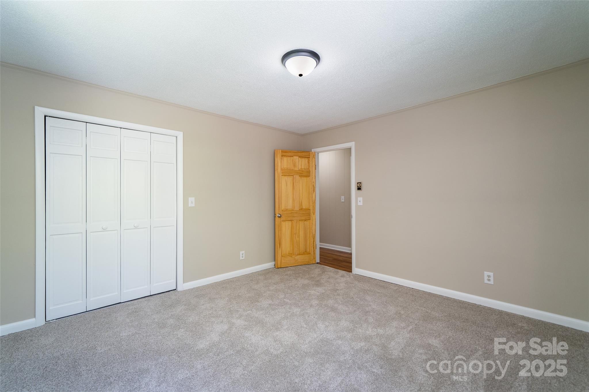 145 Jeter Mountain Road Hendersonville, NC 28739 - Photo 23 of 31 a view of an empty room
