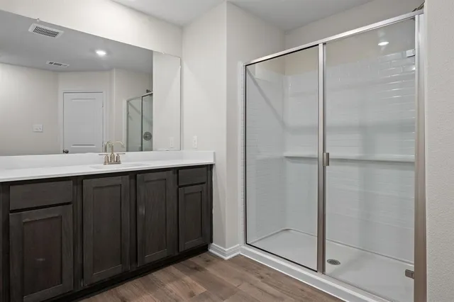 a bathroom with a bathtub and a sink