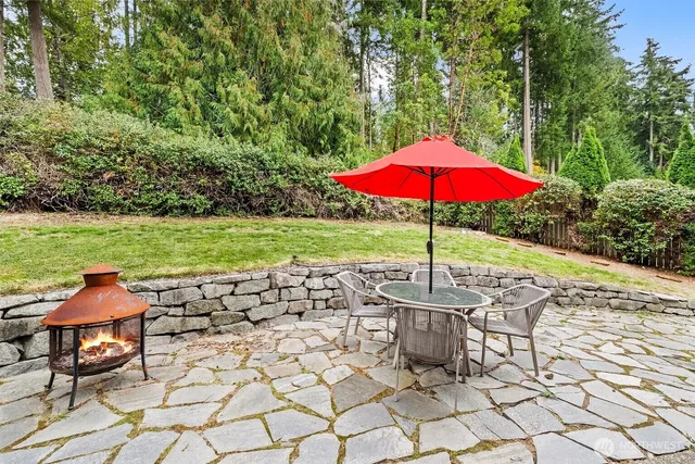 a view of an outdoor space yard swimming pool and outdoor seating