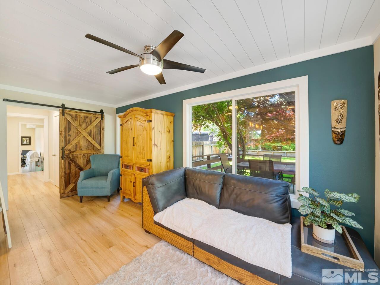 14555 Sundance Drive Reno, NV 89511 - Photo 17 of 40 a living room with furniture and a large window
