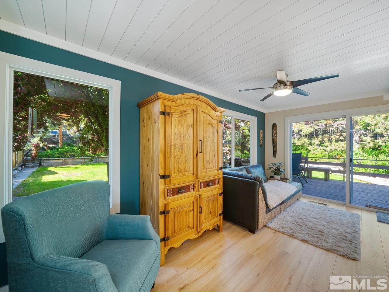 14555 Sundance Drive Reno, NV 89511 - Photo 19 of 40 a living room with furniture and a large window