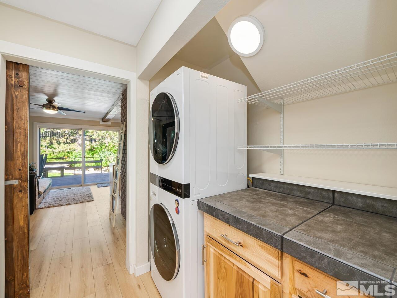14555 Sundance Drive Reno, NV 89511 - Photo 20 of 40 a utility room with dryer and washer