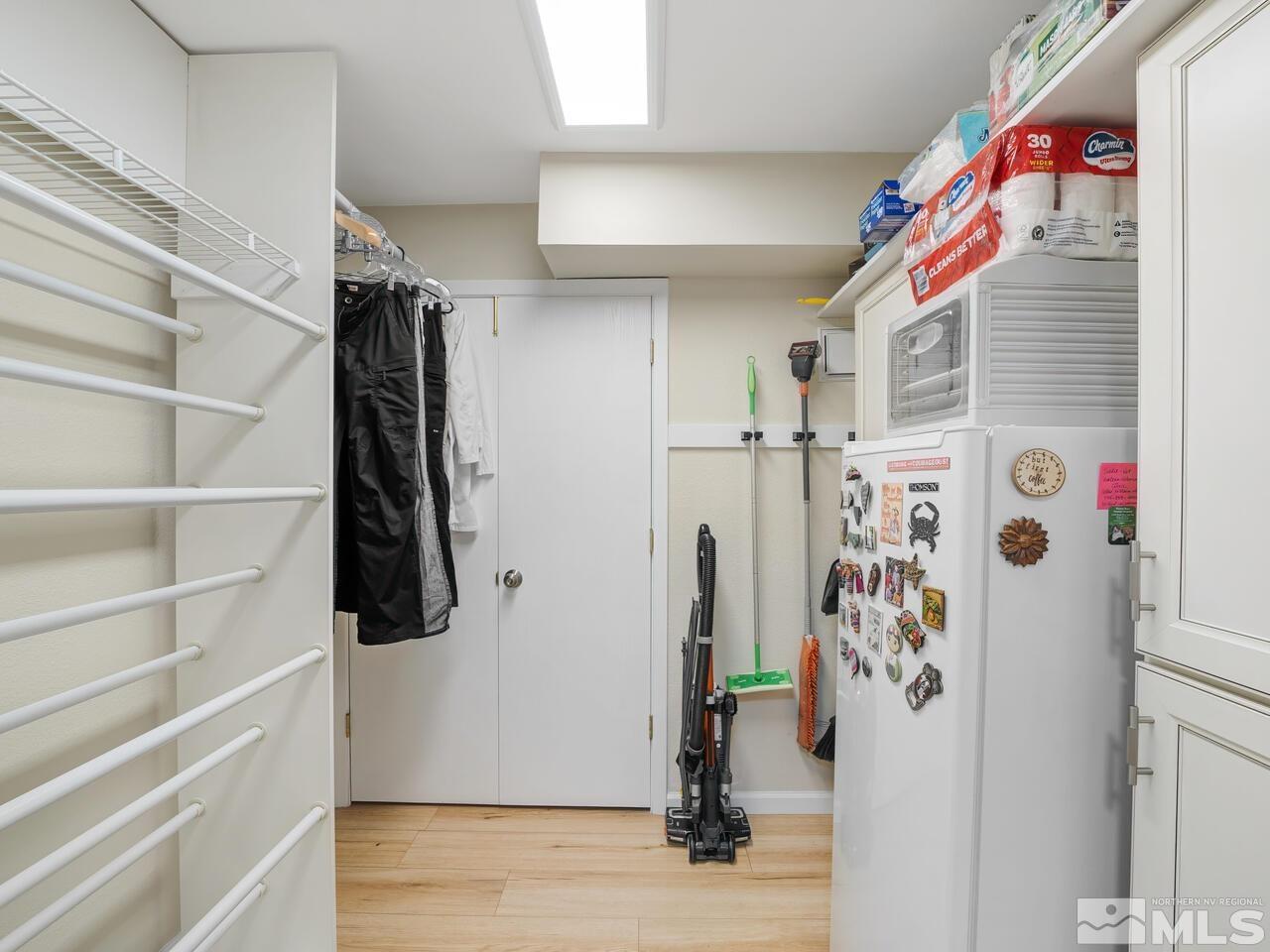 14555 Sundance Drive Reno, NV 89511 - Photo 21 of 40 a view of walk in closet with clothes and shoes