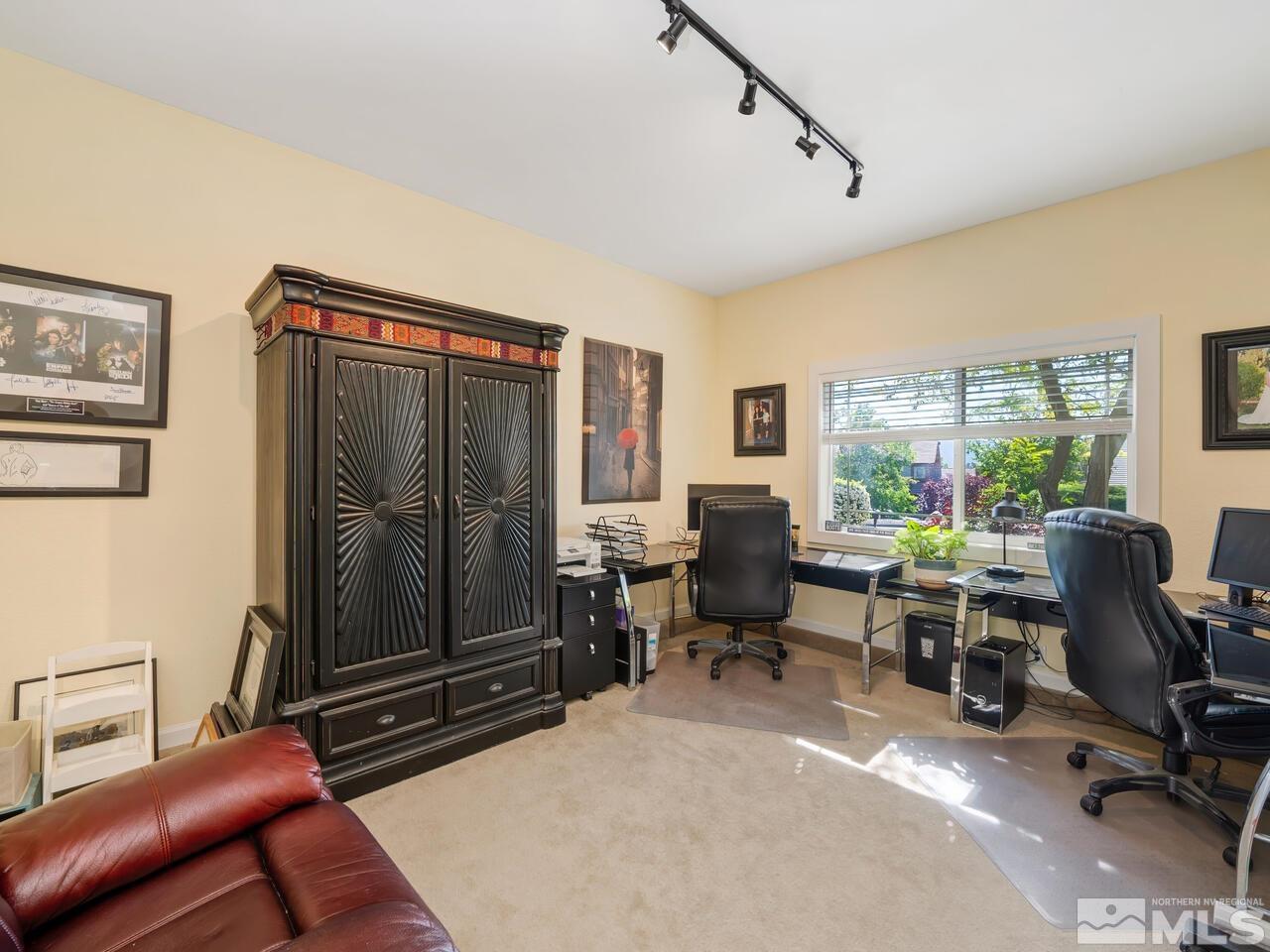 14555 Sundance Drive Reno, NV 89511 - Photo 22 of 40 a view of a livingroom with workspace and a window