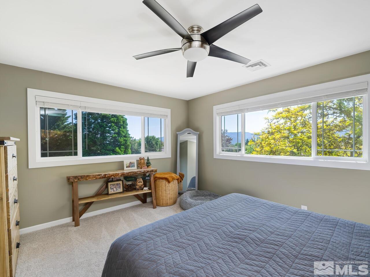 14555 Sundance Drive Reno, NV 89511 - Photo 25 of 40 a bed room with a bed and a window