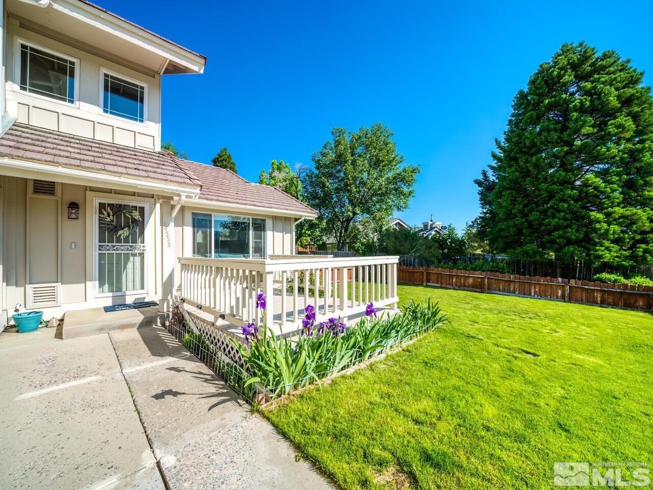 14555 Sundance Drive Reno, NV 89511 - Photo 3 of 40 a front view of a house with garden