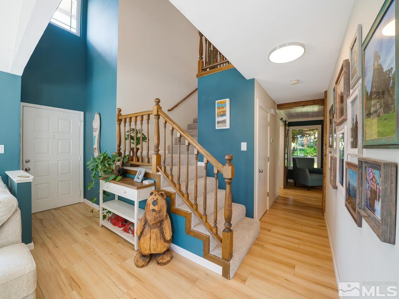 14555 Sundance Drive Reno, NV 89511 - Photo 10 of 40 a view of entryway and hall with wooden floor