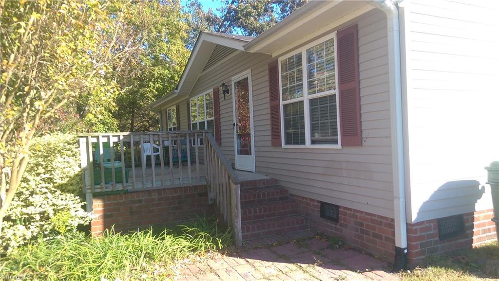 168 Reece Road Winston-Salem, NC 27107 - Photo 1 of 23 Front view with a great concrete front porch foe lazy afternoons.