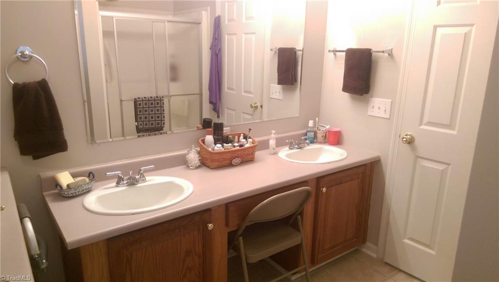 168 Reece Road Winston-Salem, NC 27107 - Photo 13 of 23 Master bath has a separate shower and soaking tub.