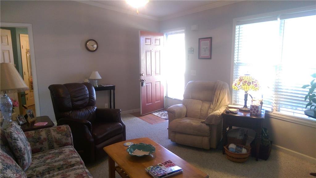 168 Reece Road Winston-Salem, NC 27107 - Photo 4 of 23 Large living room with cathedral ceiling.