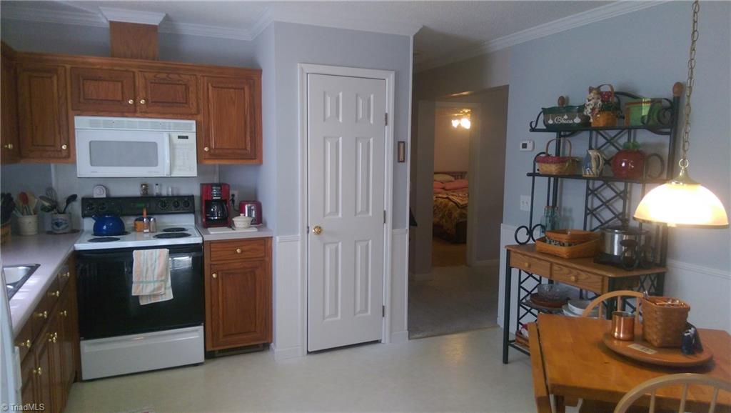 168 Reece Road Winston-Salem, NC 27107 - Photo 9 of 23 Fresh paint and wains coating in the kitchen.