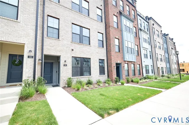 a view of a building with a yard