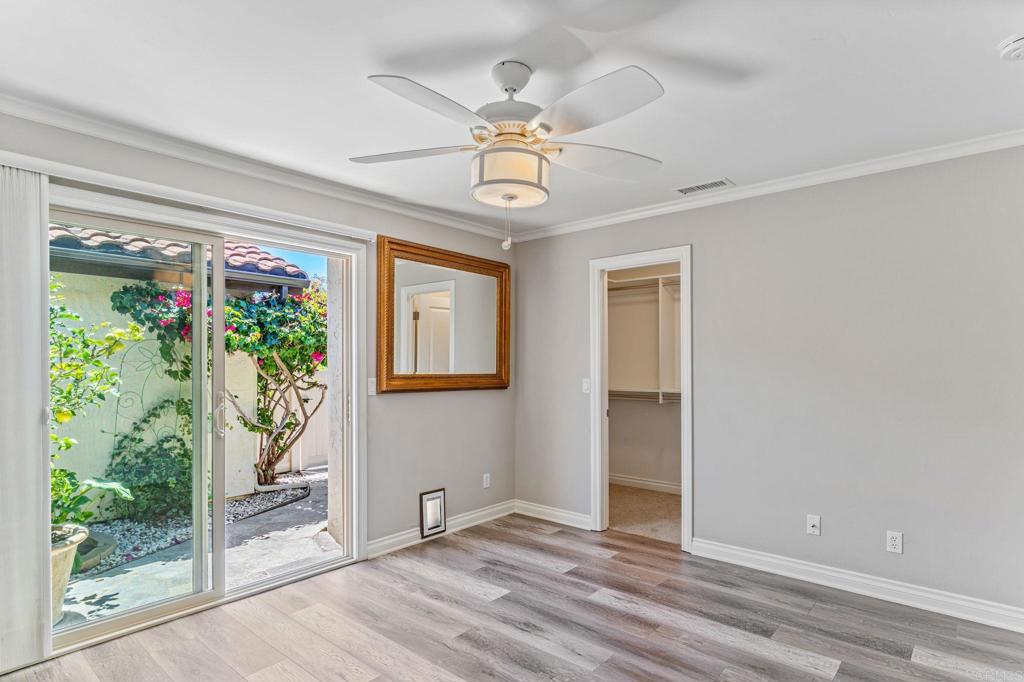 314 Volney Lane Encinitas, CA 92024 - Photo 19 of 28 a view of an entryway with wooden floor and door