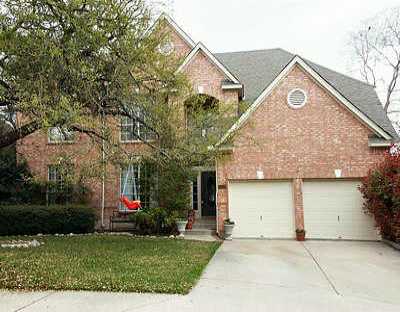 10308 Open Gate Drive Austin, TX 78726 - Photo 1 of 1 a view of a house with a yard and garage