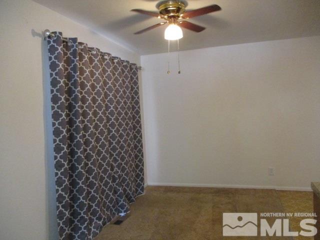 1350 Surf Way Reno, NV 89503 - Photo 3 of 22 a view of a room with window and ceiling fan