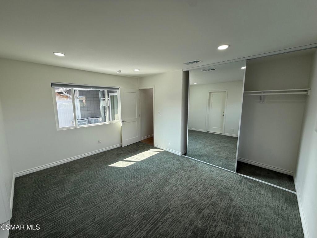 102 West Alta Green Port Hueneme, CA 93041 - Photo 12 of 23 a view of an empty room with a window