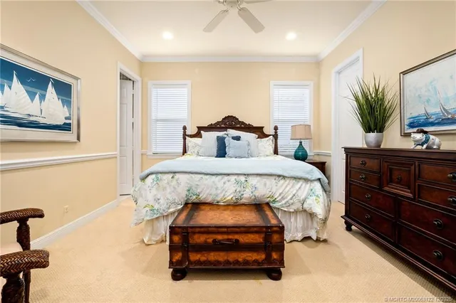 a terrace with outdoor seating and water view